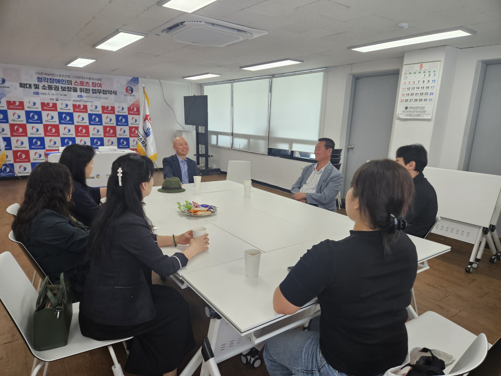 (사)한국농아인스포츠연맹-(사)한국수어통역사협회 업무협약식.jpg